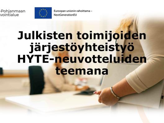 Kaksi asiantuntijaa toimistossa