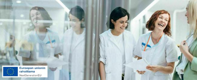 Terveysaseman työntekijöitä